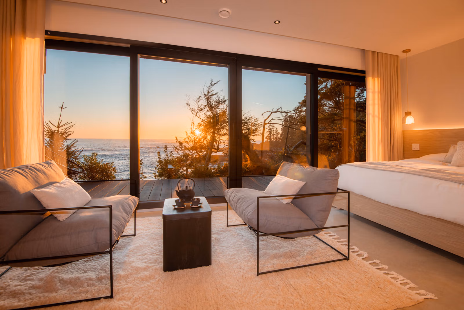 Stunning coastal house with turquoise water and rocky coastline